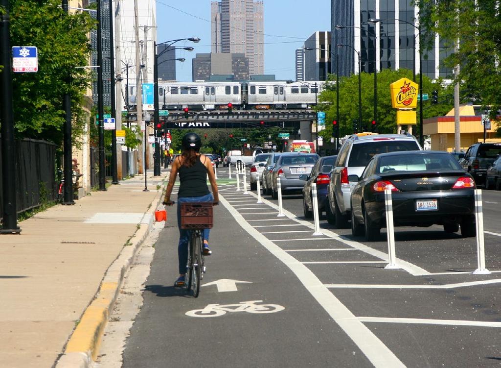 The most common types are protected bike lanes (also called cycle tracks or separated bike lanes), which include physical separation between bicyclists and vehicles. Buffered bike lane in Kansas City.