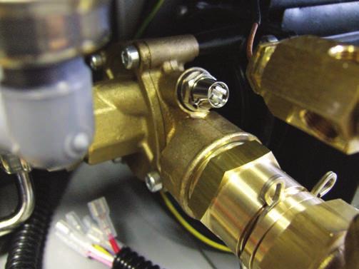 Generally a Schrader valve is fitted near the top of the expansion vessel.