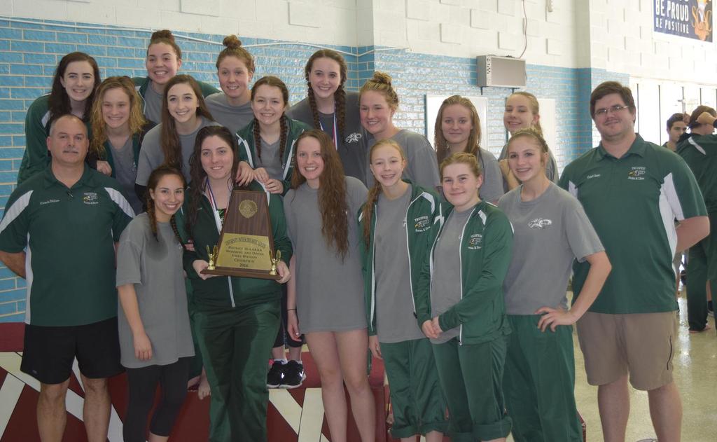 The Prosper High School Girls Swim and Dive team pose with their District 10-5A trophy.