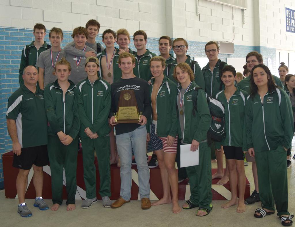 The Prosper High School Boys Swim and Dive team pose with their District 10-5A trophy.