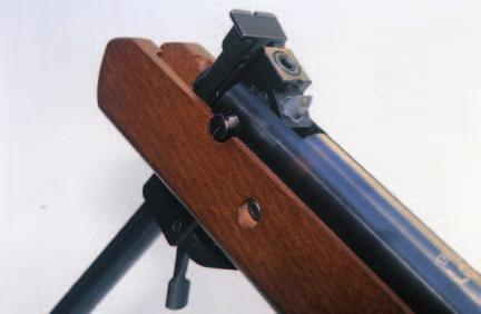 micrometer adjustable rear; Master, Tunnel foresight with inserts and identical rear sight Stock: Monte-Carlo sans cheekpiece. Challenger, black synthetic; Master beechwood, identical shape.