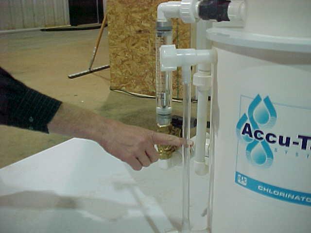 7. Once the power and water input and output connections are in place, open isolation valves and check for leaks. Supply water will begin filling the tank through the float valve.