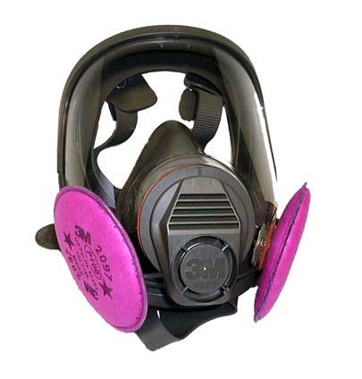 Two color-coded magenta High Efficiency Particulate Air filters trap the lead in the air being breathed into the facepiece by the worker. This is a negative pressure respirator.