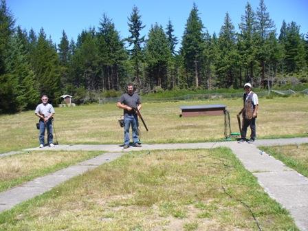 Centre: Father-son trapshooters, Ed and Mark