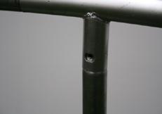 Tip: If the holes are not lining up tap with a rubber mallet or simply lift the frame and bang it down on the ground to force the leg upright further into