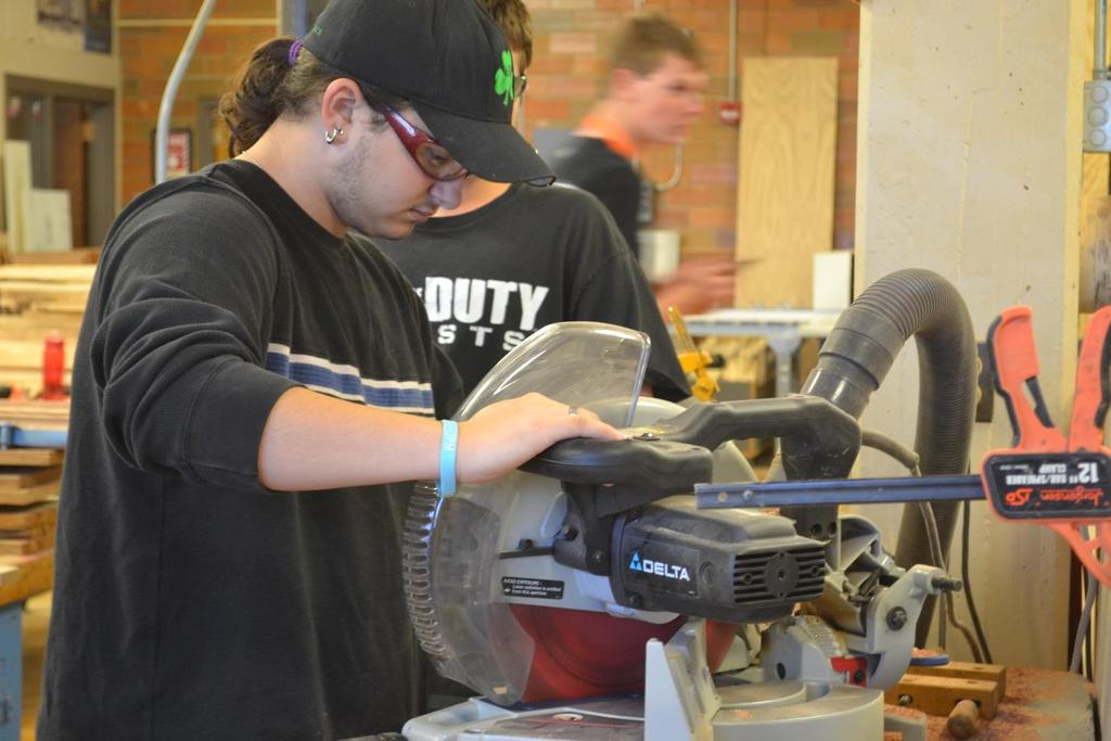 Sophomore Tyler Willitis working during block 4 Woodshop class. He has been in Tech Ed for 1 year. They are currently building cabinets and working on a project for Ms.