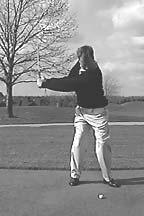 From the rear view, the club shaft should be pointed to the target line and the right arm should not be visible. A B C D A.