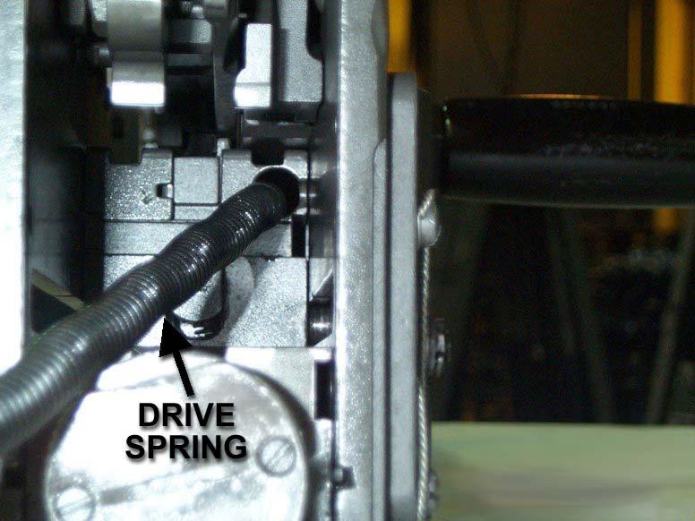 C1, FM 23-65 * Figure 2-20. Inserting drive spring and drive spring rod (with drive spring rod inside drive spring).