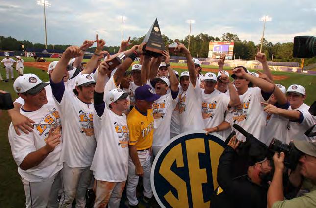 Fan Services LSU raises the 2010 SEC Tournament Championship Trophy. The Tigers have won nine overall SEC titles and three in a row. LSU is No.