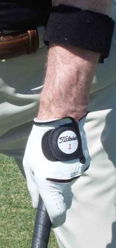 Back of hand is pronated on top of the grip. The pisiform bone (red circle) is outside the grip.