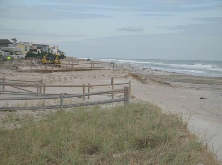 On the right the photo taken on November 2, 2012 from a similar location looking north post Sandy shows the impact of the storm evident the significant loss of dune seaward of the homes, the beach is