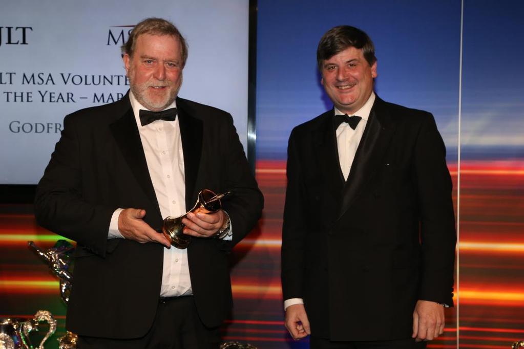 2015 - Marshals category winner Godfrey Evans Godfrey Evans receiving his award from Richard Rainbow of JLT.