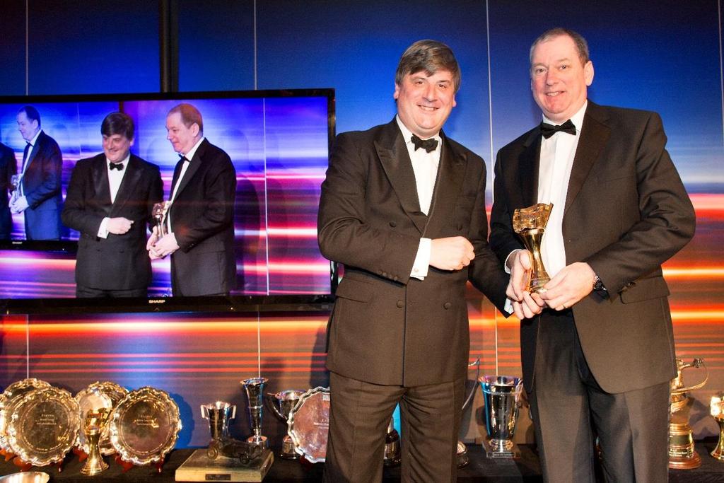 2016 - Steward / Clerk category winner Wilson Carson (Ulster Automobile Club) Wilson Carson receiving his award from Richard Rainbow of JLT.