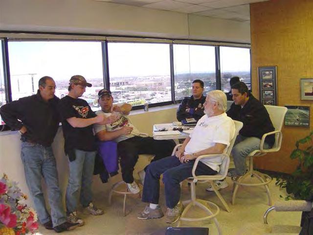 The 2005 officers met at LSPBC Treasurer Morgan Farrington s top floor corner office to discuss the budget, scheduling and other club topics.