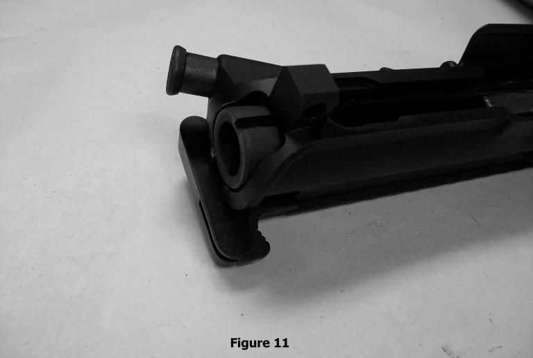 With the Bolt fully extended, reinstall the Bolt Assembly into the Upper Receiver using the slot in the Charging Handle as a guide. Refer to Figure 7.