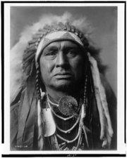 WHITE MAN RUNS HIM was a member of the Crow tribe sworn enemies of the Lakota. He served Col.