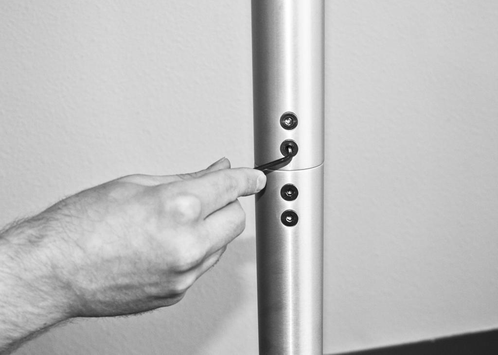 Attaching the top post 1. Assemble the top post over the bottom post pin 2.