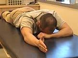Position your arm at 90 degrees elevation with 90 degrees elbow flexion.