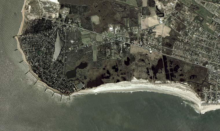 its shoreline. Erosion rates were measured around 6.1 m/yr just to the west of Cape May Inlet and between 5.2 to 6.1 m/yr in the vicinity of Cape May Meadows from 1927 to 1943 (U.S. Congress, 1953).