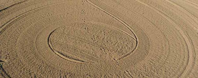 Rules and Etiquette Development: What is the rule about touching the sand in the bunker?