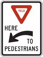 says yield to pedestrians)