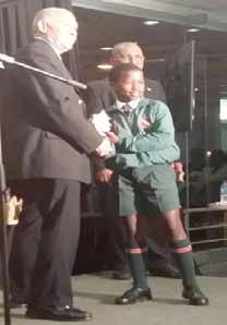 Malibongwe Ngcobo KZN U11 Captain with the President at the KZNCU Awards where he received an award