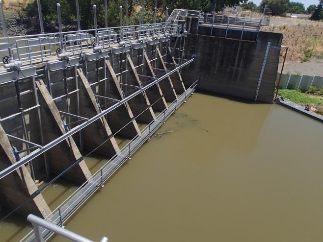 The gates were constructed in the 1930s to reduce flooding in the lower Colusa Basin from Sacramento River backwater as well as providing a drainage structure for the Colusa Drain when the Sacramento