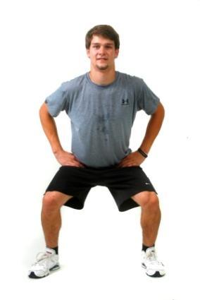 Movement: Keeping the standing leg in a squat position, straighten the other leg out to the side and