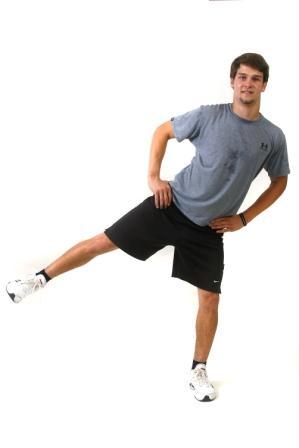 Squat with Side Lift Start: Stand with feet slightly wider than hip-width and knees bent in a 