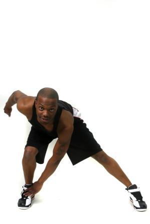 Side Lunge with Tap Start: Stand with feet hip-width apart and hands at your sides. Movement: Take a large step to the side with both toes facing forward.