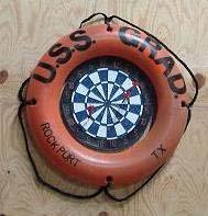 Davy Jones Darts (Target Darts) Target is plywood dart target surrounded by lifesaver ring (buoy).