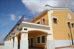The typical town square is a natural viewpoint overlooking the golf course, with a great