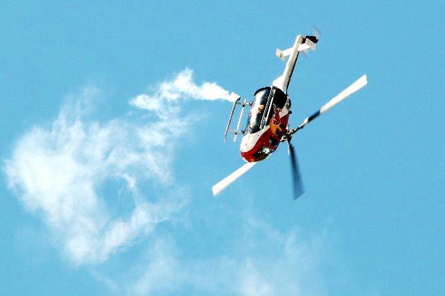 All photos this page by Frank Mormillo Red Bull s aerobatic helicopter, flown by Ventura County resident Chuck Aaron, who