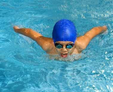 Water Skill: Swim butterfly 4 strokes with only 1 breath, then remainder of pool freestyle, swim breaststroke 30 feet with good timing and extension.