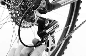 TUNING THE GEARS - REAR DÉRAILLEUR TUNING THE GEARS - REAR DÉRAILLEUR LIMIT SCREWS WARNING: YOUR GEARS ARE NOT TUNED. Tuning the gears correctly is very important.