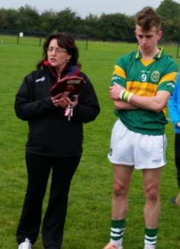 Photo of Team Football Captain Padraig Fitzgerald with County Secretary Breda Breen. Photo of Peadar Fahey exchanging some football knowledge with Liam O Mahoney.
