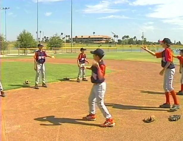 Infielders - Barehand Catch Drill 9 Group your infielders into pairs and set them up, facing each other, around 10-15 feet apart. Both players are in an athletic stance.