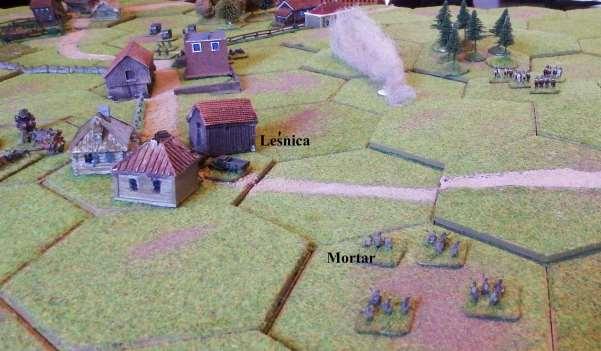 Turn 2 Probe Centre The rifle unit advances into Skawinki and opens fire on the trucks in Leśnica, which retire to the rear of