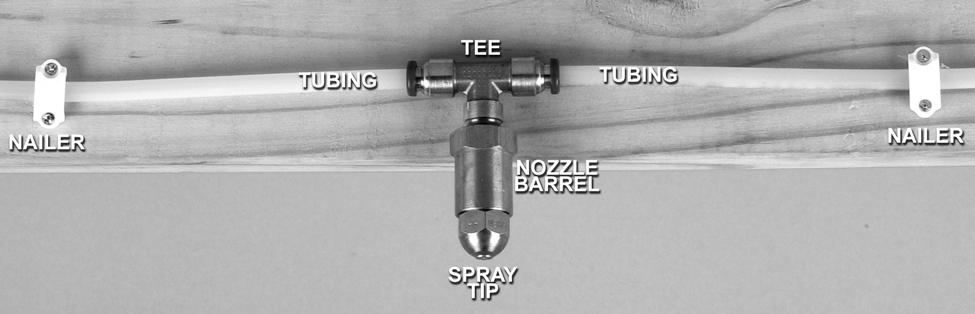 10. Push the tubing firmly into the side of the spray nozzle tee (figure 5). Pull gently to confirm that you have secure connections.