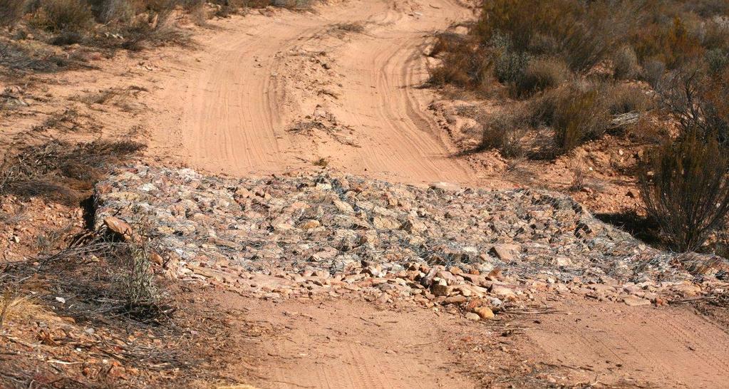 Rocky bed gabions used to facilitate river and drainage line crossings on the Kappa-Omega 765kV line.