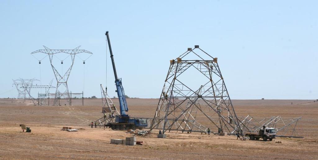 Construction of pylons along the Kappa-Omega 765kV line, illustrating the disturbance footprint typical