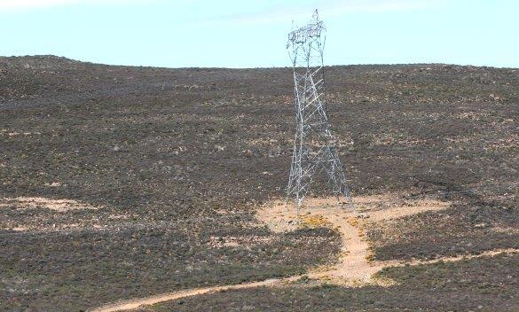 Newly constructed 400kV line near to Komsberg substation, showing the post-construction disturbance footprint, which is of relatively limited extent and superficial in nature.