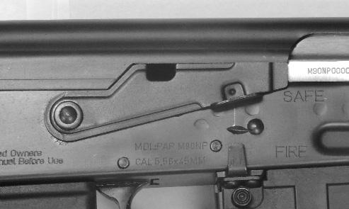Front sight 10. Flash hider 11. Barrel 12. Lower handguard 13. Magazine 14. Magazine release button 15. Trigger 16. Triggerguard 17. Rifle grip 18.