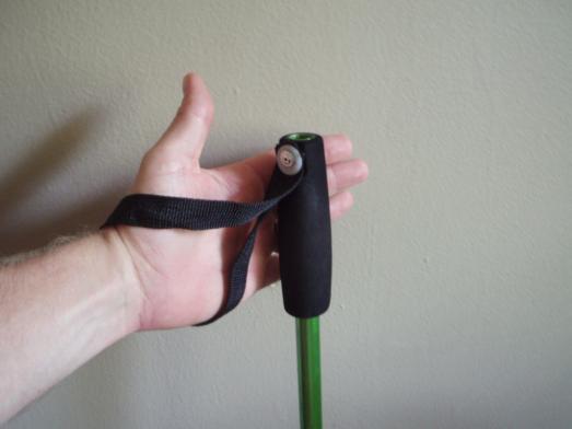 Slide hand up through strap loop from the bottom 3.