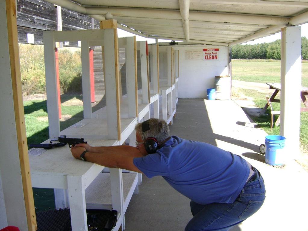 Shooting Position - Pistol Do NOT rest your handgun on the table and shoot at the 10 yard target.