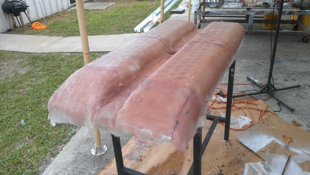 The core was then coated with two layers of fiberglass cloth and vinyl ester resin.