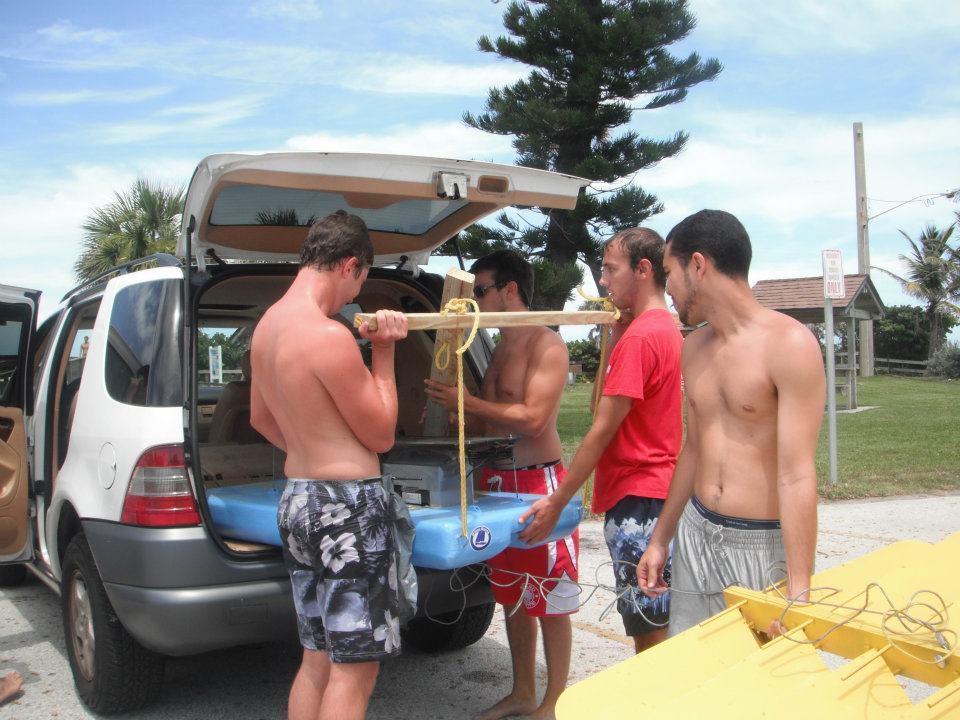 Figure 36-Transporting the glider for ocean testing On shore we had realized that a plastic gear had shred inside the rudder motor making it incapable of turning; the remote control was accidentally