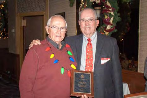 MEMBER AWARDS SIGN UP NOW FOR FEB 23 DATE NIGHT Larry Peck, left, was presented with the Outstanding Membership Award by outgoing Big SIR Daryl Jones, right, at the