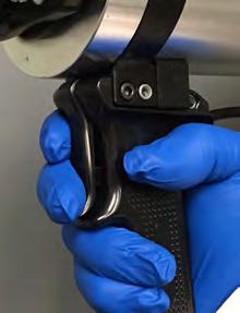 4 Slide filled Film-Pak cartridges into the aluminum retainers.