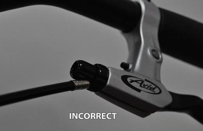 Check that the brake cable is properly seated in the brake lever. (see photo below) B. Check the front brake cable to ensure that it is not too tight, if it is then: 1.